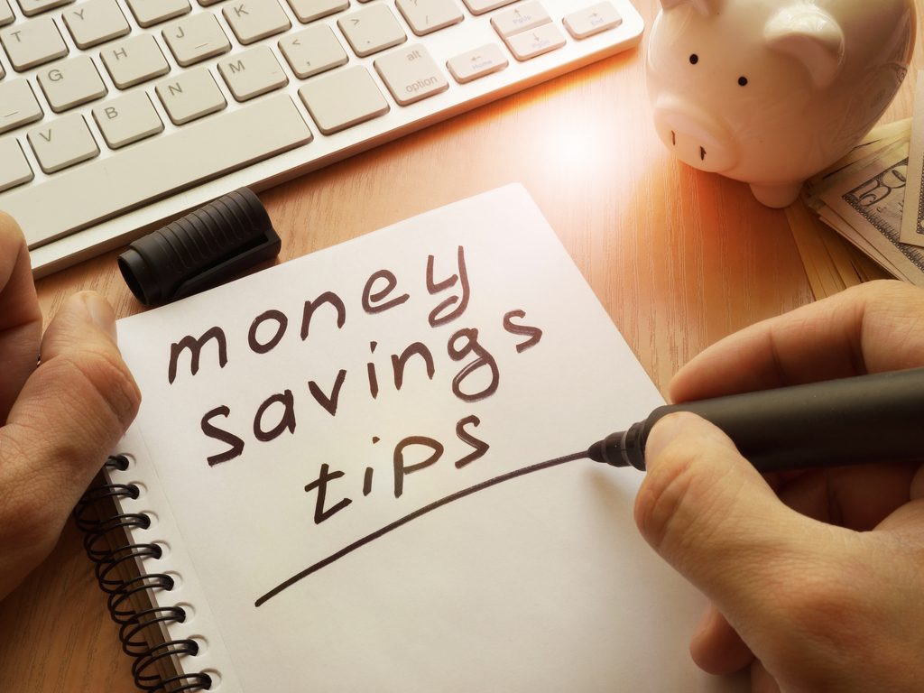 notepad money saving tips written