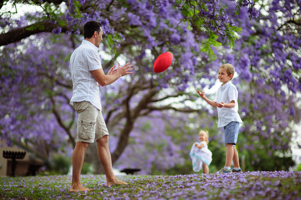 Family Playing Football - Cigno Loans